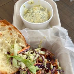 The Memphis Grill - Pulled pork sandwich and potato salad
