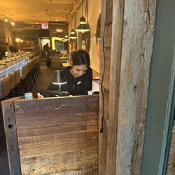 Crave Fishbar - I was shown to a corner table by a waiter when the hostess approached and asked us to move.
