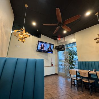 Carmen's Restaurant - a dining area with a ceiling fan - Mexican Near Me - Palm Desert, California Carmen's Restaurant - a dining area with a ceiling fan - Mexican Near Me - Palm Desert, California