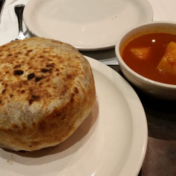 Ishtar Restaurant - Sham Quozi, before opening it up. It has lamb, chicken, spices, rice, raisins, & other goodies. It takes the Chef 45 minutes; it's worth it. - Halal Near Me - Sterling Heights, Michigan