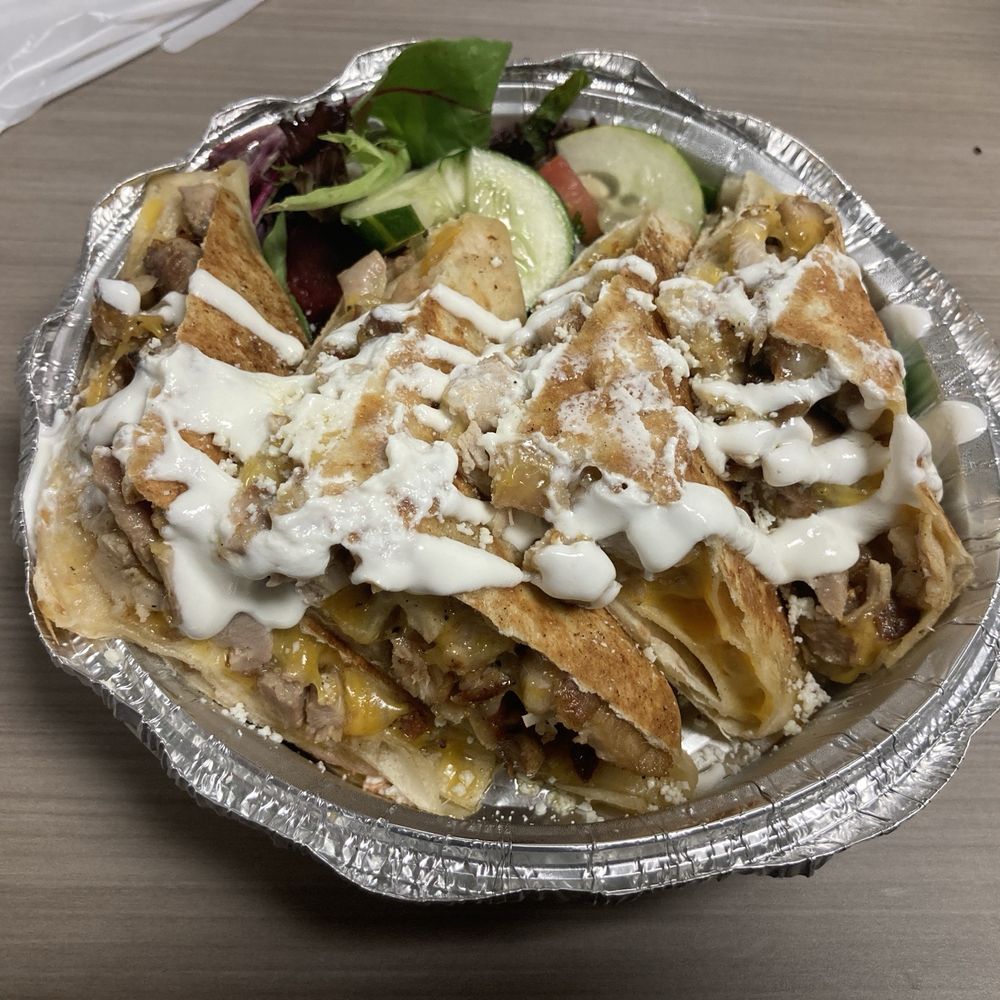 Nacho Average Eats - Really seasoned chicken quesadilla - Food Trucks Near Me