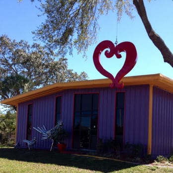 Rustic Steel - Front of Rustic Steel Creations shop with metal heart hanging from a tree. - Metal Fabricators Near Me - Tampa, Florida Rustic Steel - Front of Rustic Steel Creations shop with metal heart hanging from a tree. - Metal Fabricators Near Me - Tampa, Florida