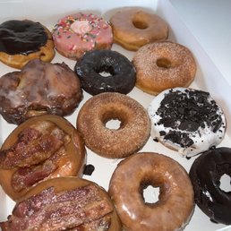 Maple bacon, apple fritter, Boston cream, strawberry, chocolate, cinnamon sugar, glazed, and Oreo donuts