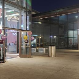 Exterior outside entrance of Cupcakin Bake Shop - Exterior at night with Chase Center holiday decor - San Francisco, California Exterior outside entrance of Cupcakin Bake Shop - Exterior at night with Chase Center holiday decor - San Francisco, California