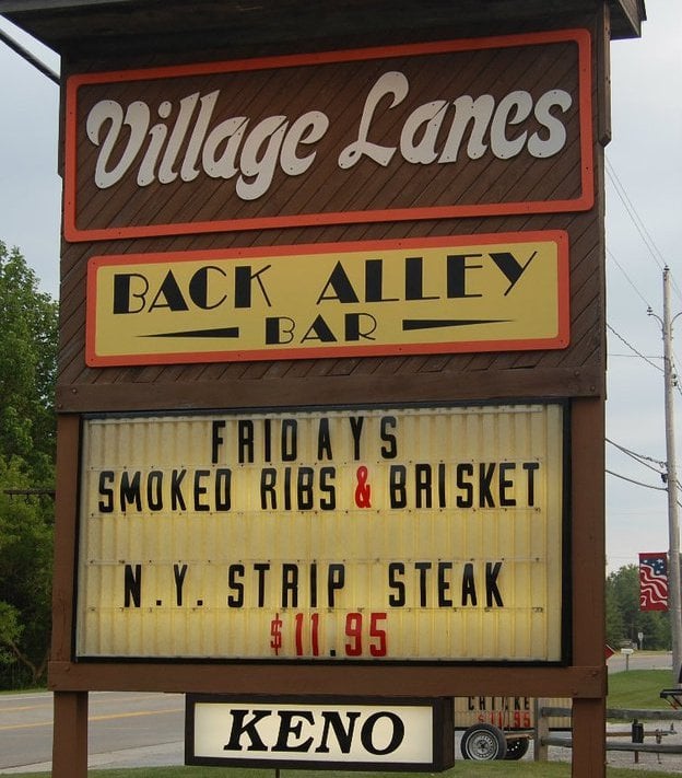 Village Lanes Logo