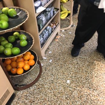 Wawa - a man standing in a grocery store - Convenience Stores Near Me - Thorndale, Pennsylvania