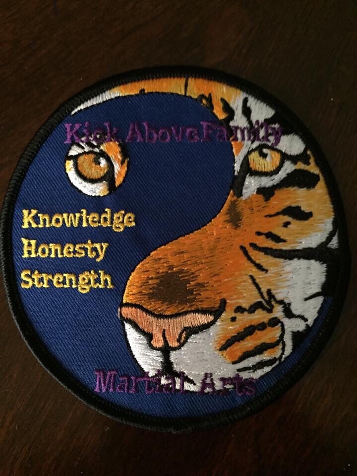 Kick Above Family Martial Arts Logo