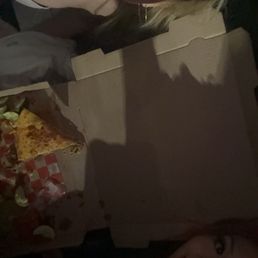 Me and friend eat pizza