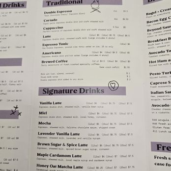 Jones Coffee - Spring 2025 Menu - The menu from Jones Coffee displays a selection of traditional espresso drinks including double espresso, cortado, cappuccino, latte, espresso tonic, americano, and brewed coffee, with prices and sizes. It also features signature drinks like vanilla latte, miel, mocha, lavender vanilla latte, brown sugar & spice latte, maple cardamom latte, honey oat matcha latte, and house-made syrups, with detailed descriptions and pricing. The menu is printed on paper with section headings and a small heart doodle. - Coffee & Tea Near Me - Chaska, Minnesota