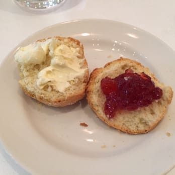 Harlequin Restaurant - Delicious scone with clotted cream and jam - British Near Me - London, XGL Harlequin Restaurant - Delicious scone with clotted cream and jam - British Near Me - London, XGL