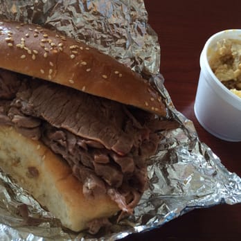Ray Ray's Hog Pit - Brisket sandwich with a small order of cheesy potatoes. - Barbeque Near Me - Columbus, Ohio Ray Ray's Hog Pit - Brisket sandwich with a small order of cheesy potatoes. - Barbeque Near Me - Columbus, Ohio