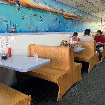 Over Easy Cafe - two people sitting at a table - Cafes Near Me - Oakland Park, Florida
