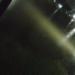 Holiday Estates - Flooded street/parking lot, as the water reached our porch. Normally is a two-way street separated by a median
