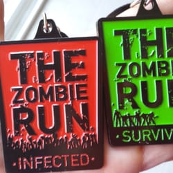 The Zombie Run - Hubby's ''infected'' Zombie Runner medal and My ''Survivor'' medal. Woohooo. Suck it Zombies, you can't get me!