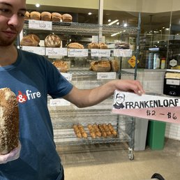 Field and Fire employee holding the Frankenloaf