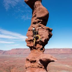 Magnum Expeditions - Guided rock climbing on one of Moab's iconic desert towers with sweeping desert views.