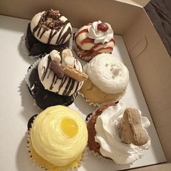 Caked Up - Chocolate Reese's Peanut Butter, S'mores, Lemon, Strawberry Cheesecake, Wedding Cake, Pupcake