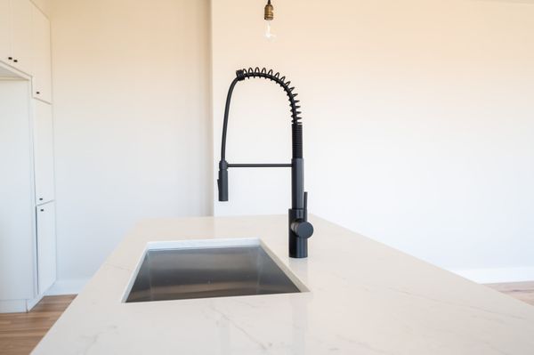 The Grove Plumbing and Heating Logo