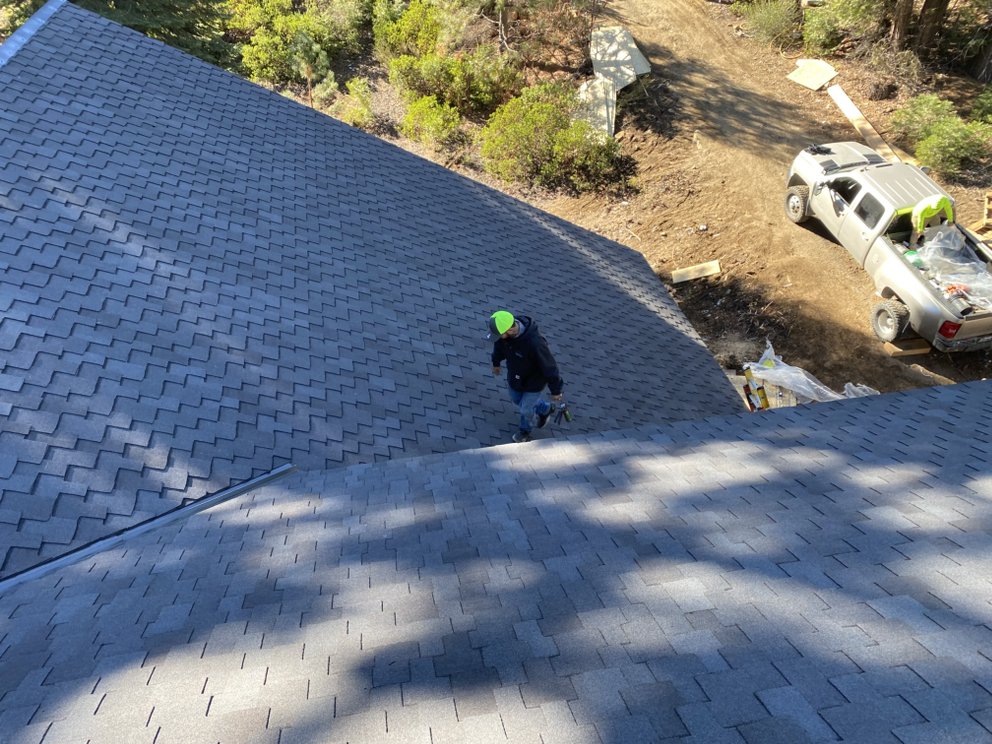 Slide of Modern Roofers and Restoration