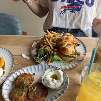 Miriam - Side of Latkes and Grilled Chicken Sandwich - Mediterranean Near Me - New York, New York Miriam - Side of Latkes and Grilled Chicken Sandwich - Mediterranean Near Me - New York, New York