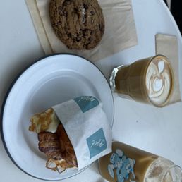 Almond Macadamia Latte (hot and iced), bacon egg and cheese sandwich, chocolate chip cookie. Almond Macadamia Latte (hot and iced), bacon egg and cheese sandwich, chocolate chip cookie.
