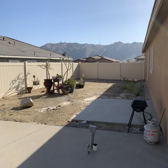 Jose Argueta Concrete - a patio with a grill and a table - General Contractors Near Me Jose Argueta Concrete - a patio with a grill and a table - General Contractors Near Me