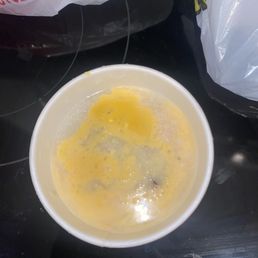 Supposed to be Grits with cheese. Clearly that's just dirty white and yellow water. Supposed to be Grits with cheese. Clearly that's just dirty white and yellow water.