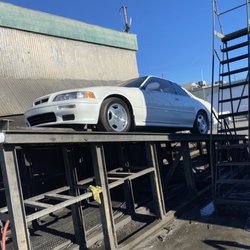 S F Oakland Truck Stop - 1995 Acura Legend coupe on ramp