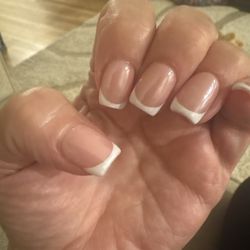 Victoria Nail Bar & Lash - If you want concave nails ask for John. I have never had nails that dip in the center. Horrible!!