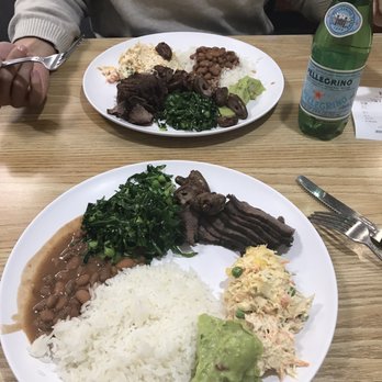 Terra Brasilis - Rice, beans, colored greens, guacamole, chicken salad, and steak. Food was absolutely amazing!! - Brazilian Near Me - Framingham, Massachusetts