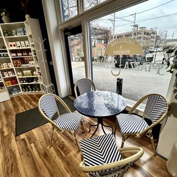 Piazza Pelino - a table and chairs in front of a window - Sandwiches Near Me - Columbus, Ohio