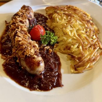 Restaurant Stadel - Raclette with veal sausage - Hotels & Travel Near Me - Zermatt, VS