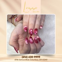 Lusso Nail Spa - Let love and happiness fill the air this summer with heart-shaped pink accents that will add a touch of romance and playfulness to your