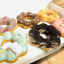 Mochi & Mochi - Half Dozen Mochi Donuts.  Flavors, clockwise from upper left: Ube, Nutella, Churro, Strawberry, Oreo, & Cotton Candy