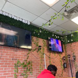 Calis Corner - Waiting area equipped with televisions