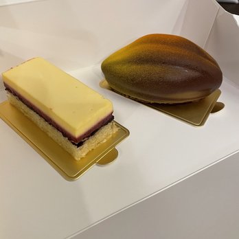 Fleur Sauvage Chocolates - Passion fruit/mango and blueberry mousse with almond cake and the cocoa pod  (chocolate mousse, cremeaux, raspberry jam and almond Cake) - Chocolatiers & Shops Near Me - Windsor, California