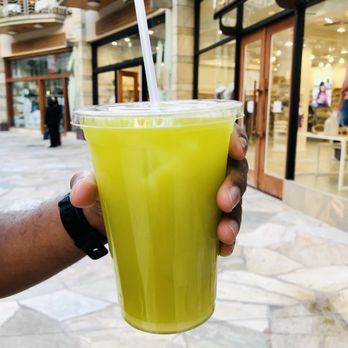 Aloha Sugarcane Juice - a hand holding a cup of juice - Juice Bars & Smoothies Near Me - Honolulu, Hawaii Aloha Sugarcane Juice - a hand holding a cup of juice - Juice Bars & Smoothies Near Me - Honolulu, Hawaii