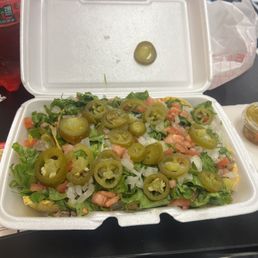 Turkey nachos topped with lettuce, tomatoes, onion and jalapeños! Turkey Nachos. Turkey nachos topped with lettuce, tomatoes, onion and jalapeños! Turkey Nachos.