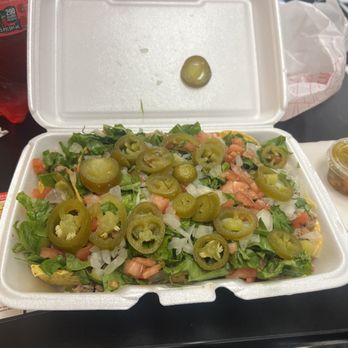 Just Turkey - Turkey nachos topped with lettuce, tomatoes, onion and jalapeños! Turkey Nachos. - Barbeque Near Me - Minneapolis, Minnesota Just Turkey - Turkey nachos topped with lettuce, tomatoes, onion and jalapeños! Turkey Nachos. - Barbeque Near Me - Minneapolis, Minnesota