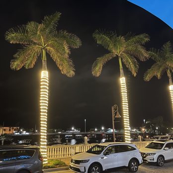 Tavern On The Bay - Night time view of the bay from the outdoor patio seating in November 2022 - New American Near Me - Naples, Florida Tavern On The Bay - Night time view of the bay from the outdoor patio seating in November 2022 - New American Near Me - Naples, Florida