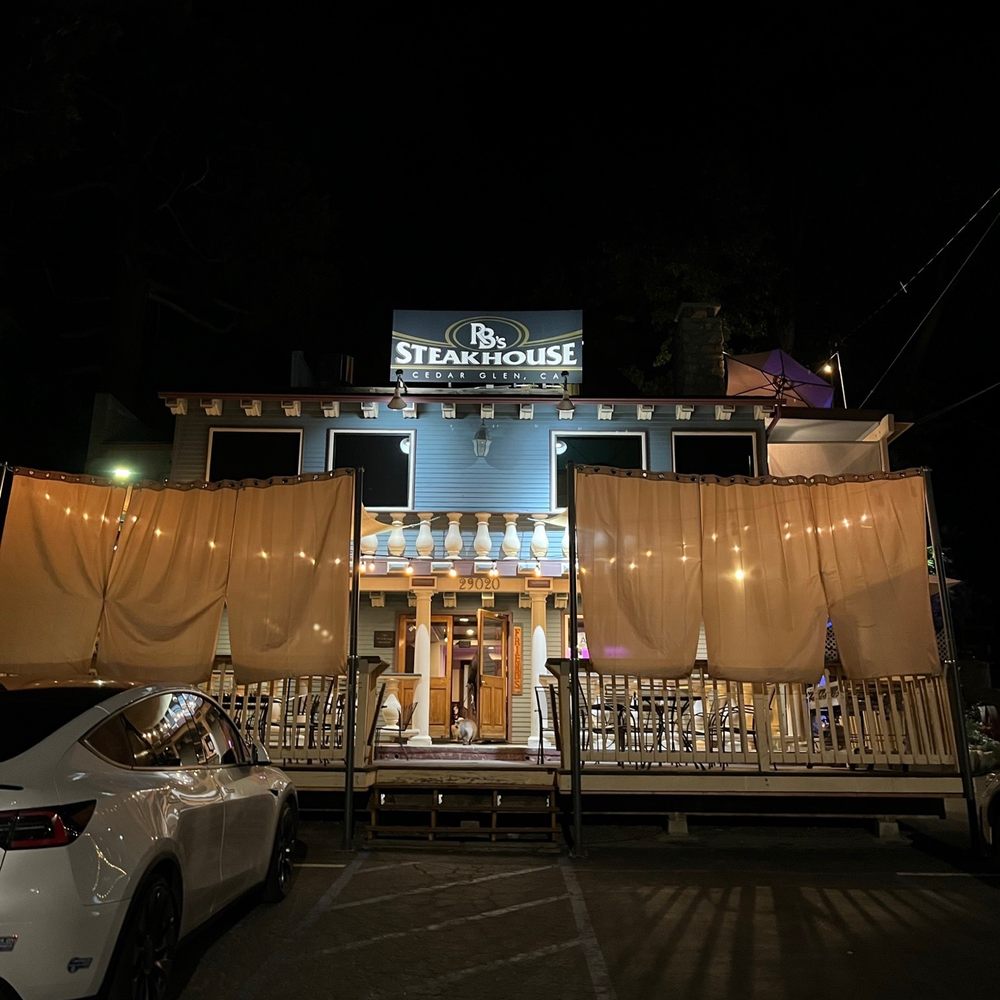 RB's Steakhouse - The bar entrance during night time hours. The dining entrance is around the right side of the place. You'll see a sign. - Steakhouses Near Me - Lake Arrowhead, California RB's Steakhouse - The bar entrance during night time hours. The dining entrance is around the right side of the place. You'll see a sign. - Steakhouses Near Me - Lake Arrowhead, California