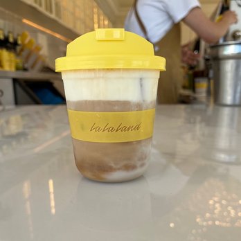 La La Land - This adult sippy-cup contains my favorite beverage here, the 'La La Latte' (small size). - Coffee & Tea Near Me - Los Angeles, California La La Land - This adult sippy-cup contains my favorite beverage here, the 'La La Latte' (small size). - Coffee & Tea Near Me - Los Angeles, California