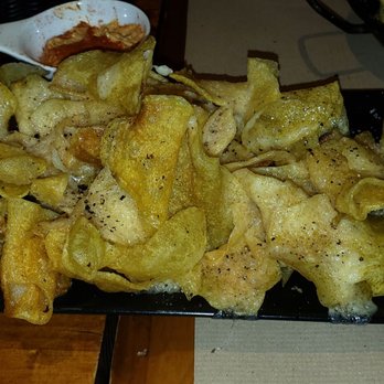 Bocca di Bonifacio - Appetizer of fried potato chips. - Italian Near Me - Barcelona, B Bocca di Bonifacio - Appetizer of fried potato chips. - Italian Near Me - Barcelona, B