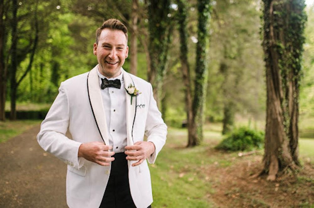 William T Clothiers Logo