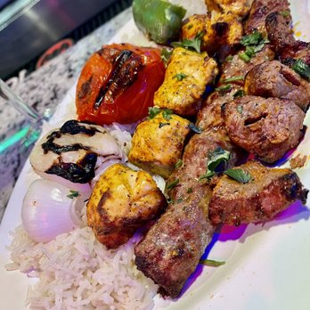 Miraj Restaurant - a plate of grilled meat and rice - Middle Eastern Near Me - Niles, Illinois