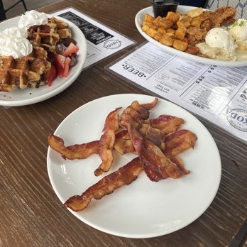 Takoda - Waffles with chocolate chip bits and fruit Eggs Benedict with potatoes - American Near Me - Washington, DC, District of Columbia Takoda - Waffles with chocolate chip bits and fruit Eggs Benedict with potatoes - American Near Me - Washington, DC, District of Columbia