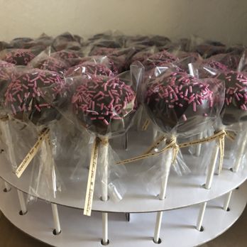 Maya & Jonalyn's Kitchen - a display of chocolate covered lollipops - Desserts Near Me Maya & Jonalyn's Kitchen - a display of chocolate covered lollipops - Desserts Near Me