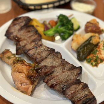 Chicken Maison - a plate of food on a table - Middle Eastern Near Me - Redondo Beach, California Chicken Maison - a plate of food on a table - Middle Eastern Near Me - Redondo Beach, California