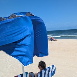 Ocean House - Umbrella collapsed by the wind. Definitely not worth $15