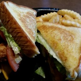 Chicken bacon club with crinkle fries. Chicken bacon club with crinkle fries.